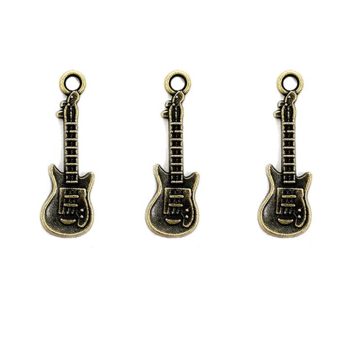 dije de metal figura de guitarra