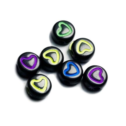 separador negro con corazón de colores fosforescentes